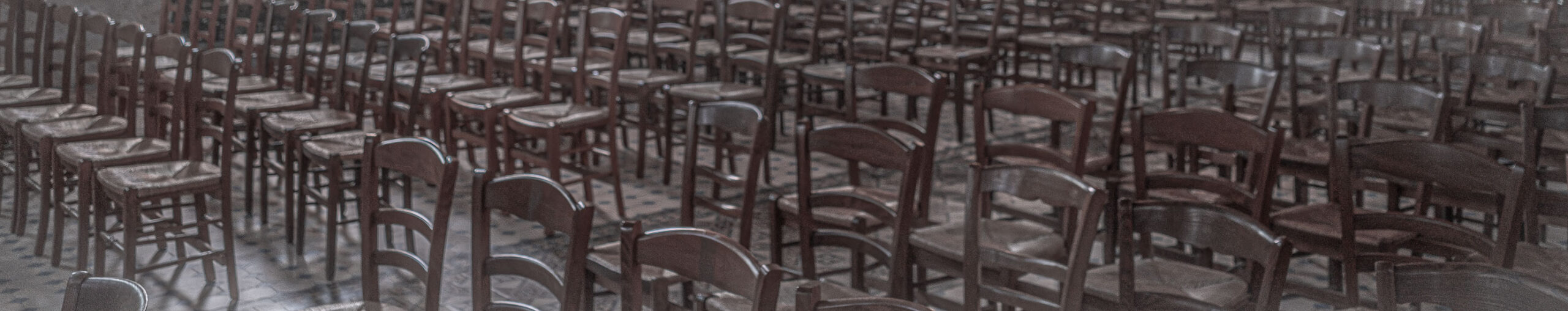Empty chairs in empty church